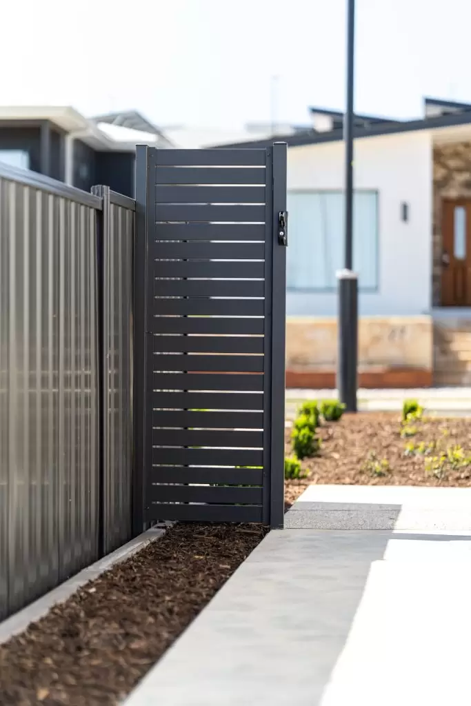 The Benefits of Concreting Around Your Home: How to Choose the right colour and texture for your space aluminium-slatting-gate-scaled.jpeg